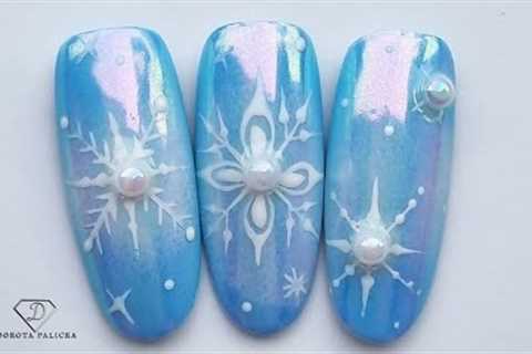 Aurora Mirror Chrome snowflakes nail art. Winter nail design.